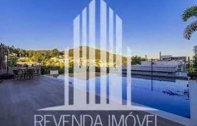 Imagem: A casa em condomínio possui 5 Dormitórios, 5 Banheiros, 3