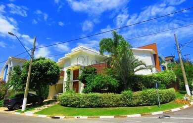 Imagem: A casa em condomínio possui 4 Dormitórios, 5 Banheiros, 4