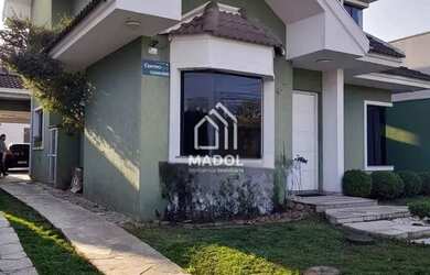 Imagem: A casa possui 4 Dormitórios, 4 Banheiros, 4 Vagas na garagem