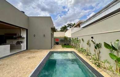 Imagem: A casa em condomínio possui 4 Dormitórios, 5 Banheiros, 4