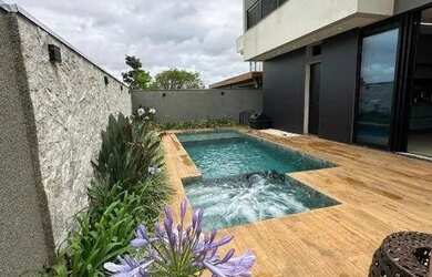 Imagem: A casa em condomínio possui 4 Dormitórios, 5 Banheiros, 4