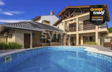 Imagem: A casa em condomínio possui 5 Dormitórios, 5 Banheiros, 4