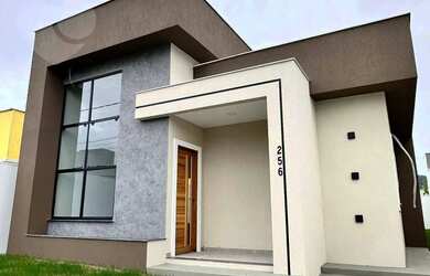 Imagem: A casa possui 3 Dormitórios, 3 Banheiros, 2 Vagas na garagem