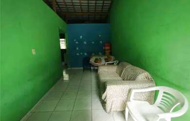 Imagem: A casa possui 2 Dormitórios, 1 Banheiro, 1 Vaga na garagem