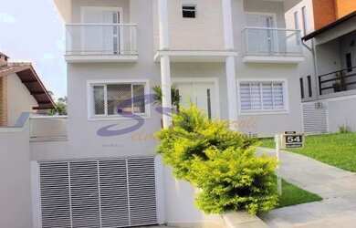 Imagem: A casa em condomínio possui 4 Dormitórios, 5 Banheiros, 4