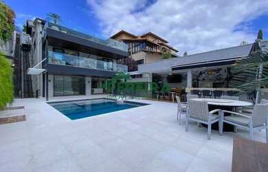 Imagem: A casa em condomínio possui 4 Dormitórios, 5 Banheiros, 4