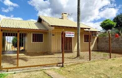 Imagem: A casa à venda possui 2 Dormitórios, 1 Banheiro, 2 Vagas na