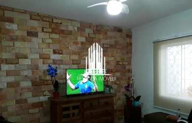 Imagem: A casa possui 2 Dormitórios, 2 Banheiros, 3 Vagas na garagem