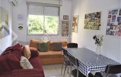 Imagem: O apartamento possui 2 Dormitórios, 1 Banheiro, 1 Vaga na garagem