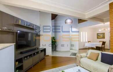 Imagem: A casa possui 4 Dormitórios, 5 Banheiros, 2 Vagas na garagem