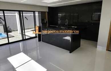 Imagem: A casa em condomínio possui 3 Dormitórios, 5 Banheiros, 312m²