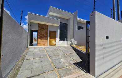 Imagem: A casa possui 3 Dormitórios, 3 Banheiros, 2 Vagas na garagem