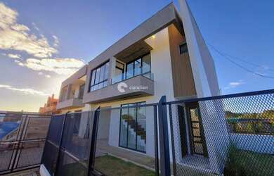 Imagem: A casa em condomínio possui 3 Dormitórios, 3 Banheiros, 2