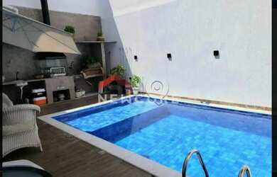 Imagem: A casa possui 4 Dormitórios, 5 Banheiros, 3 Vagas na garagem