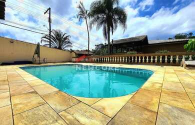 Imagem: A casa possui 5 Dormitórios, 5 Banheiros, 5 Vagas na garagem