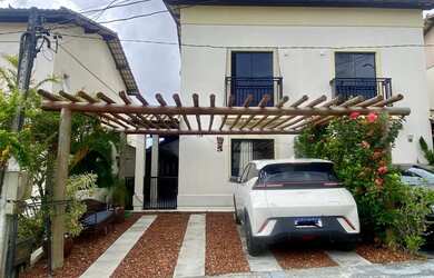 Imagem: A casa em condomínio possui 2 Dormitórios, 4 Banheiros, 2