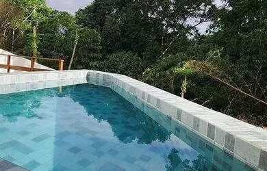 Imagem: A casa em condomínio possui 3 Dormitórios, 4 Banheiros, 2