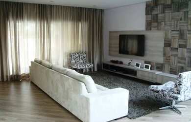 Imagem: A casa possui 3 Dormitórios, 3 Banheiros, 3 Vagas na garagem