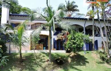 Imagem: A casa em condomínio possui 4 Dormitórios, 5 Banheiros, 5