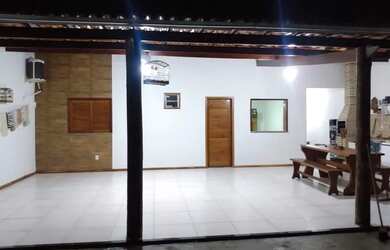 Imagem: A casa possui 2 Dormitórios, 2 Banheiros, 3 Vagas na garagem