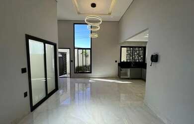 Imagem: A casa possui 3 Dormitórios, 3 Banheiros, 2 Vagas na garagem