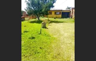 Imagem: A casa possui 2 Dormitórios, 1 Banheiro, 1 Vaga na garagem