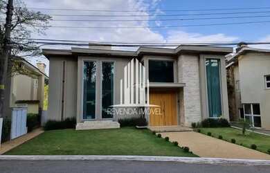 Imagem: A casa em condomínio possui 5 Dormitórios, 5 Banheiros, 5