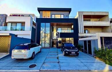 Imagem: A casa em condomínio para alugar possui 4 Dormitórios, 5 Banheiros