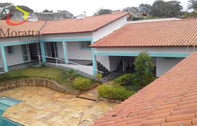 Imagem: A casa em condomínio possui 4 Dormitórios, 5 Banheiros, 5