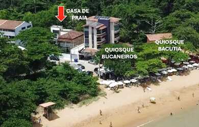 Imagem: A casa possui 2 Dormitórios, Acomodam 8 pessoas, 3 Vagas na