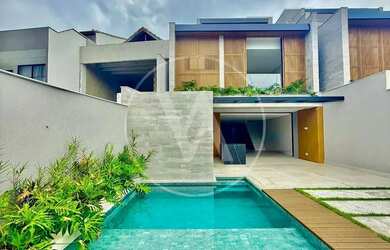 Imagem: A casa em condomínio possui 4 Dormitórios, 5 Banheiros, 3