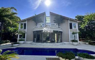 Imagem: A casa possui 5 Dormitórios, 3 Banheiros, 5 Vagas na garagem