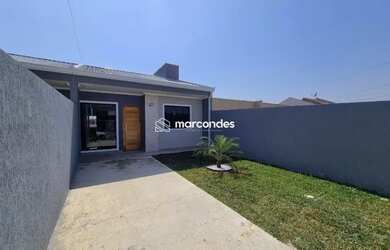 Imagem: A casa possui 3 Dormitórios, 3 Banheiros, 2 Vagas na garagem