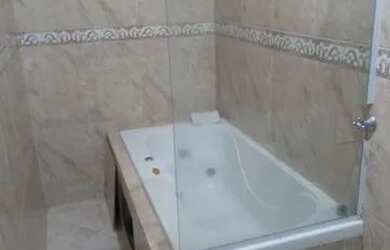 Imagem: A casa possui 3 Dormitórios, 2 Banheiros, 2 Vagas na garagem