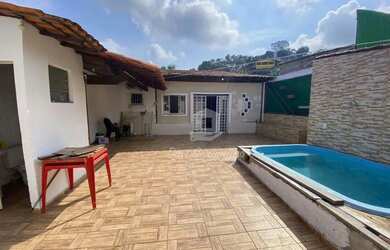 Imagem: A casa possui 3 Dormitórios, 3 Banheiros, 3 Vagas na garagem