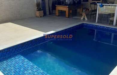 Imagem: A casa possui 4 Dormitórios, 3 Banheiros, 4 Vagas na garagem