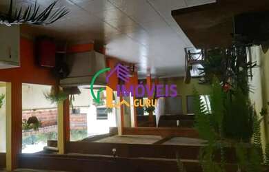 Imagem: A casa possui 3 Dormitórios, 2 Banheiros, 3 Vagas na garagem