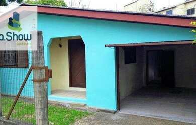 Imagem: A casa possui 3 Dormitórios, 1 Banheiro, 3 Vagas na garagem