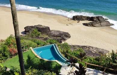 Imagem: A casa possui 5 Dormitórios, 5 Banheiros, 3 Vagas na garagem