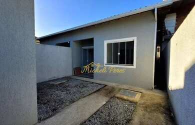 Imagem: A casa possui 2 Dormitórios, 2 Banheiros, 2 Vagas na garagem