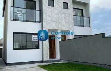 Imagem: A casa possui 2 Dormitórios, 3 Banheiros, 2 Vagas na garagem