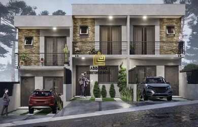 Imagem: A casa possui 2 Dormitórios, 3 Banheiros, 2 Vagas na garagem