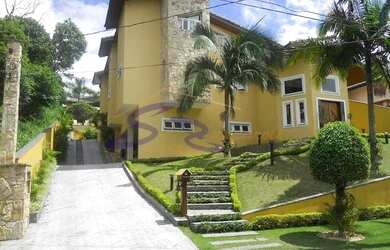 Imagem: A casa em condomínio possui 4 Dormitórios, 3 Banheiros, 5