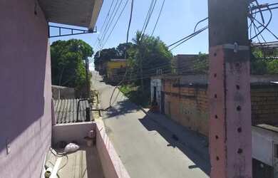 Imagem: A casa possui 2 Dormitórios, 1 Banheiro, 1 Vaga na garagem