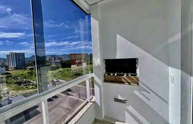 Imagem 6: Apartamento com 2 dormitórios sacada churrasqueira e vaga de garagem