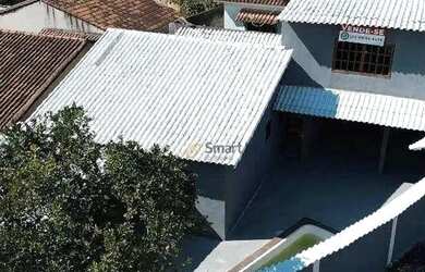 Imagem: A casa possui 3 Dormitórios, 3 Banheiros, 245m² de Área e