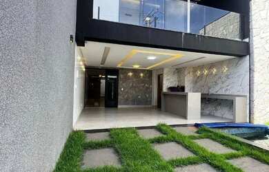 Imagem: A casa possui 4 Dormitórios, 5 Banheiros, 3 Vagas na garagem