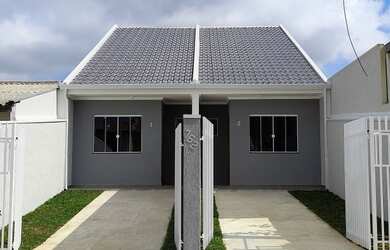 Imagem: A casa possui 3 Dormitórios, 2 Banheiros e está localizado