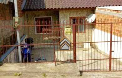 Imagem: A casa possui 2 Dormitórios, 1 Banheiro, 1 Vaga na garagem