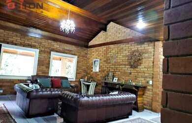 Imagem: A casa em condomínio possui 3 Dormitórios, 4 Banheiros, 5